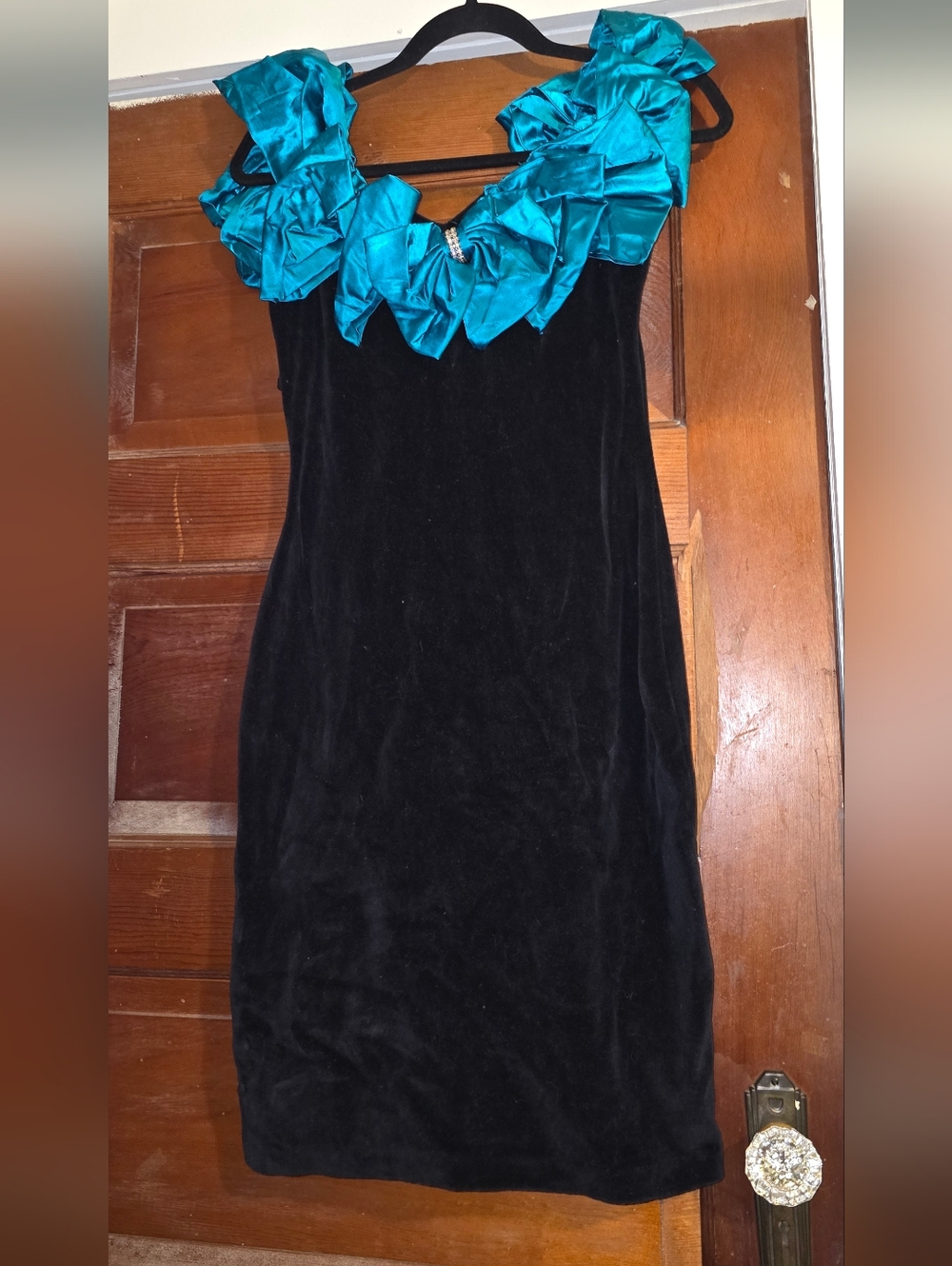 Notorious Black Velvet Dress with Teal Ruffle Neckline